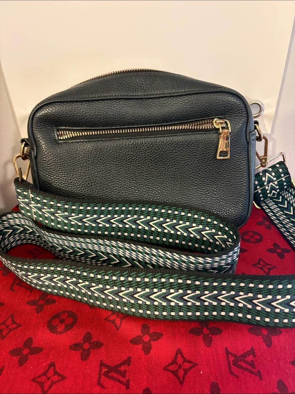 POM POM LONDON Black  Pebbled Leather Crossbody Bag with Green Patterned Strap